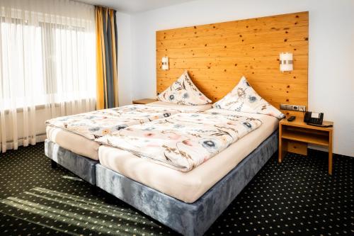 מיטה או מיטות בחדר ב-Zweistapfenweg 9a