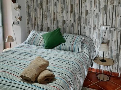 Posteľ alebo postele v izbe v ubytovaní Apartamento Rural Cristi