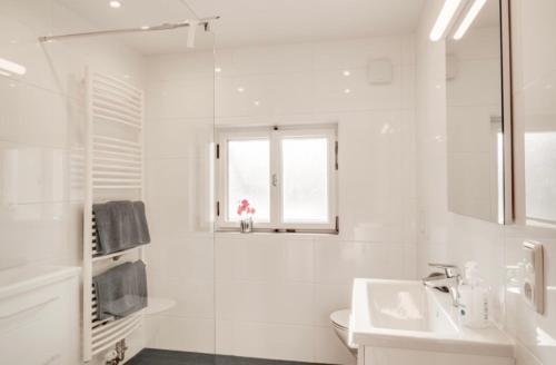 Ванная комната в Ferienhaus Veronika mit 2000qm Garten und Bergblick