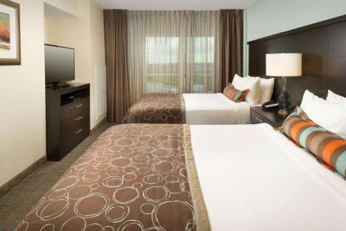 เตียงในห้องที่ Sonesta ES Suites Dallas - Las Colinas