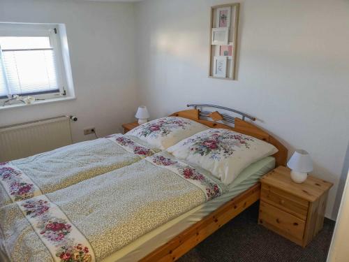 Postel nebo postele na pokoji v ubytování Ferienwohnung Alte Schmiede