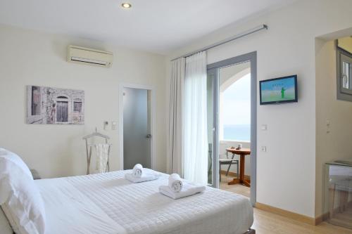 Postel nebo postele na pokoji v ubytování Melia Sol Art Studios