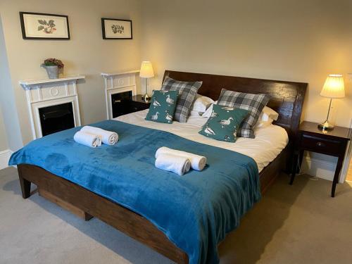 Tempat tidur dalam kamar di The Richmond Arms Rooms