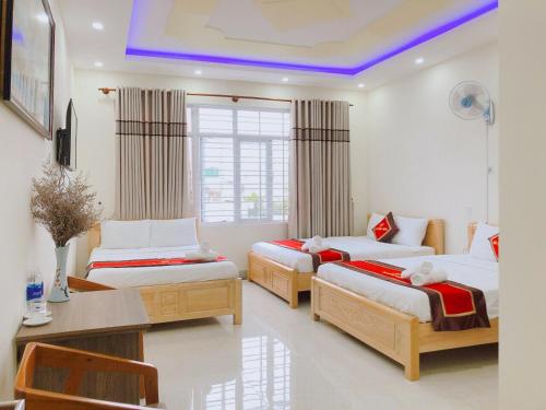 Lova arba lovos apgyvendinimo įstaigoje Hotel Hải Trường