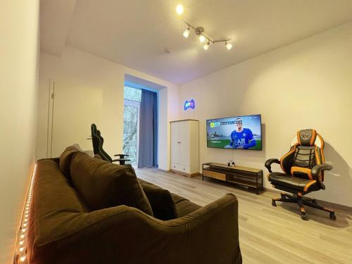 Foto JayBnB - PS5 55 Zoll 4K TV Gaming Apartment 3
