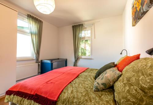 Postel nebo postele na pokoji v ubytování Ferienwohnung Jenzigblick