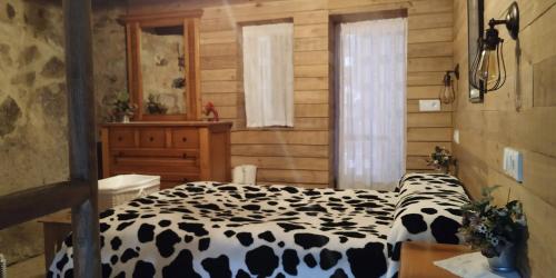 Posteľ alebo postele v izbe v ubytovaní Apartamentos Caleros