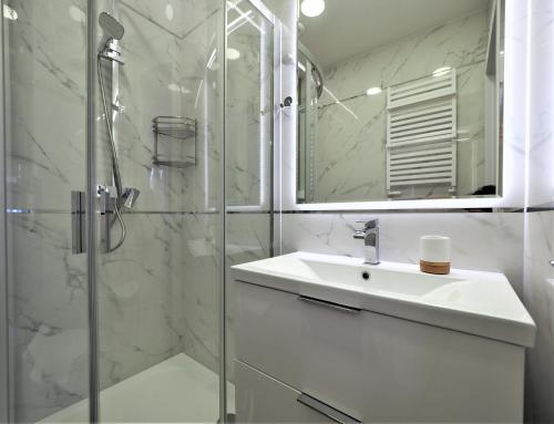 Kúpeľňa v ubytovaní VIP Apartamenty Modrzejewska Residence
