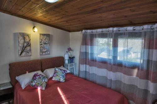 A bed or beds in a room at Corfu Cosy Penthouse with a View