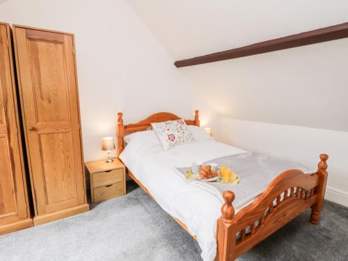Llit o llits en una habitació de Hawthorn Dale Cottage