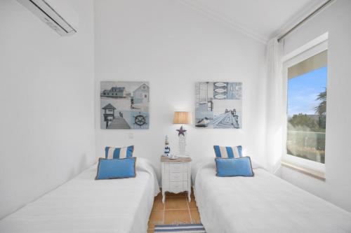 Ένα ή περισσότερα κρεβάτια σε δωμάτιο στο Superb, relaxing and tranquil 3 bed Apartment in Central Algarve