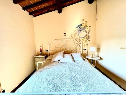 Ένα ή περισσότερα κρεβάτια σε δωμάτιο στο Casa Pozzi