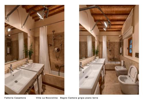a bathroom with two sinks and a toilet at Fattoria Casamora - Villa La Nocciolina in Pian di Scò