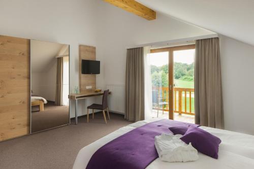 מיטה או מיטות בחדר ב-Sapia Hotel Rheinsberg
