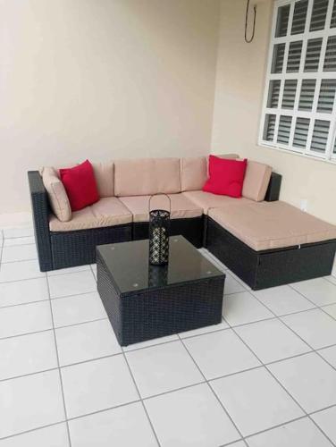 a living room with a couch and a coffee table at Otay Studio great patio near Otay Crossing & Airport in Tijuana