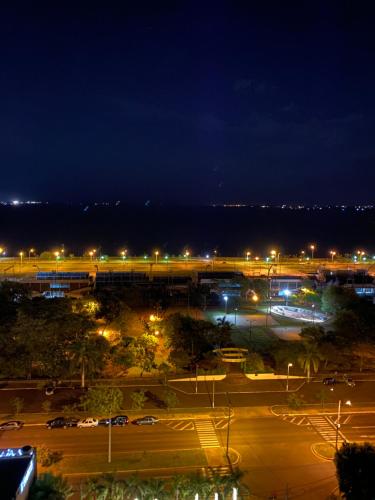 a view of a parking lot at night at 25 homeApart in Encarnación