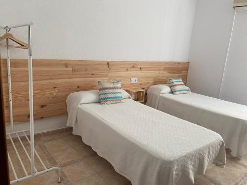 Postel nebo postele na pokoji v ubytování Hostal Barbate