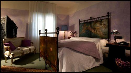 Giường trong phòng chung tại Locanda le Monache