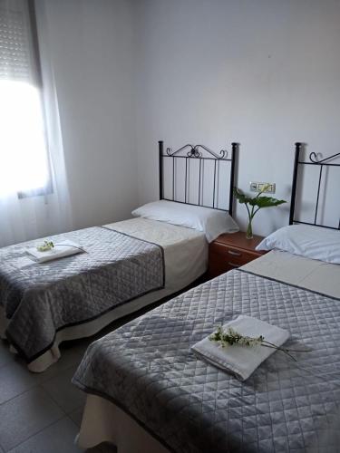Ένα ή περισσότερα κρεβάτια σε δωμάτιο στο Hostal San Cristobal - Pontedeume