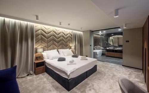 Postel nebo postele na pokoji v ubytování Hotel Turist
