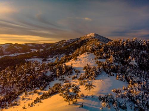 an aerial view of a mountain covered in snow at Apartman Tajena in Zlatibor