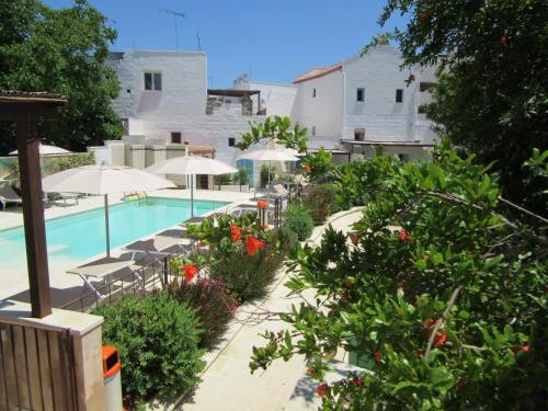 The swimming pool at or close to Dimora Da Tito - La Corte dei Colori