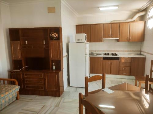 Kuchyň nebo kuchyňský kout v ubytování Apartamento Conileño con Terraza