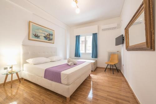 Postel nebo postele na pokoji v ubytování Victoria Majestic Suites Apartments