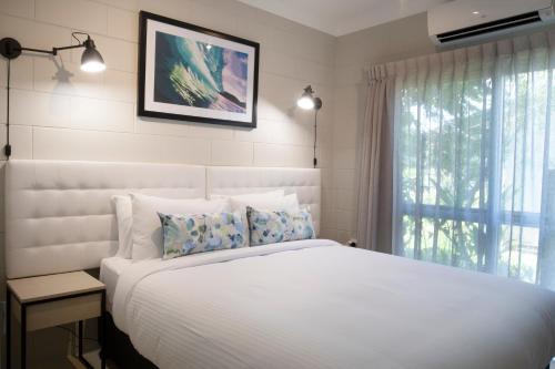 Ліжко або ліжка в номері Apartments at Mission Beach