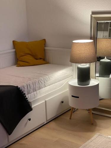 Ένα ή περισσότερα κρεβάτια σε δωμάτιο στο Schickes Apartment mit Balkon in Düsseldorf