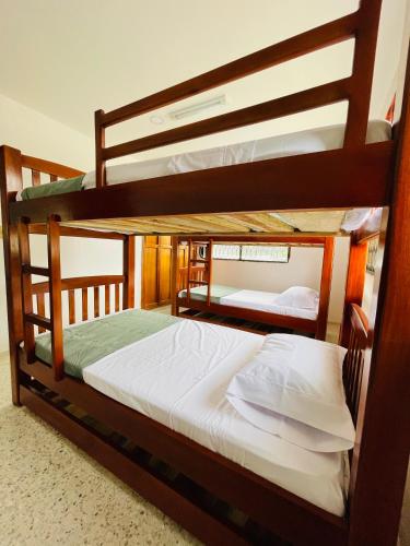 a couple of bunk beds in a room at MADILI DEL MAR in Santiago