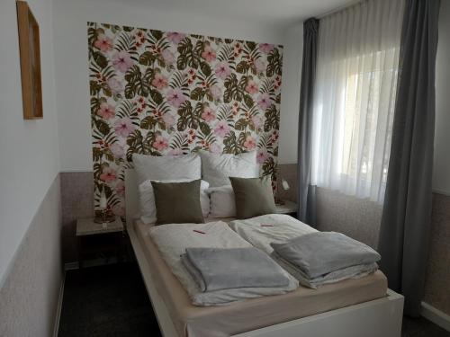 Ένα ή περισσότερα κρεβάτια σε δωμάτιο στο Ferienhaus Heiner und Walter