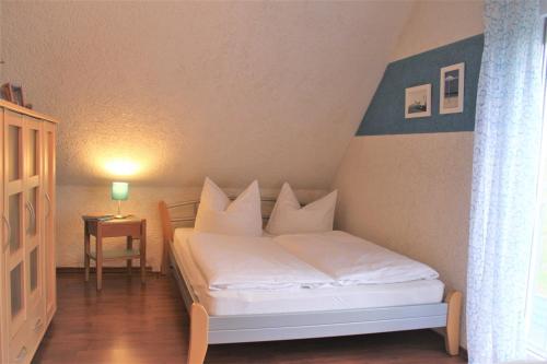 En eller flere senge i et værelse på Schneckenhaus