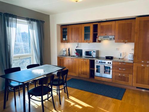 Kuchyň nebo kuchyňský kout v ubytování Tallinn Center Apartment