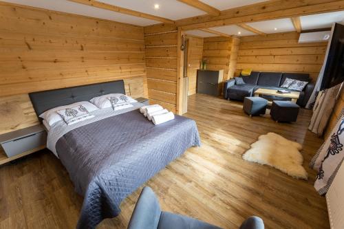 Katil atau katil-katil dalam bilik di WILLA Z BALI SPA - Jacuzzi Sauny Grota Solna-Tężnia