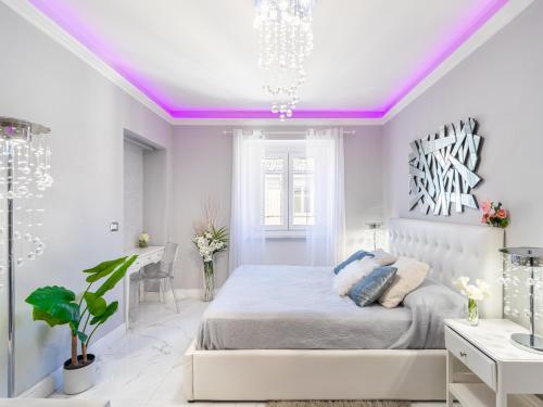 Posteľ alebo postele v izbe v ubytovaní ELEGANT SUITE - in centro PortaNuova