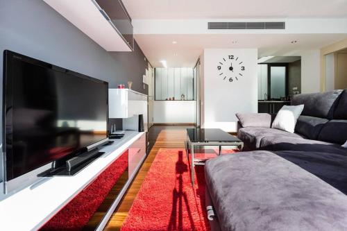 Een zitgedeelte bij Modern Luxury Apartment Fira Bcn