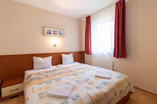Postel nebo postele na pokoji v ubytování Family Apartments
