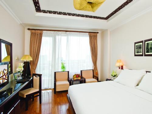 TV a/nebo společenská místnost v ubytování Cherish Hue Hotel