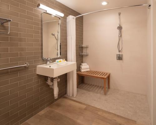 a bathroom with a sink and a mirror at La Siesta Resort & Villas in Islamorada