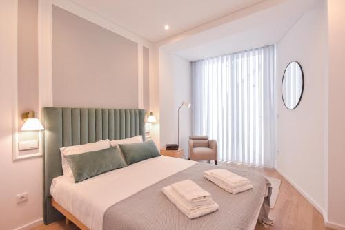 Postel nebo postele na pokoji v ubytování Oporto lovely house deluxe