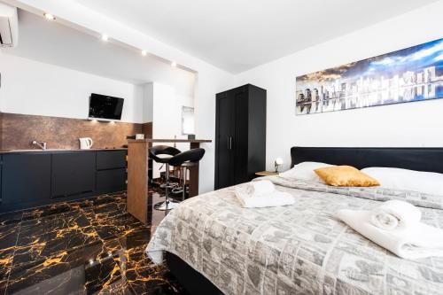 Voodi või voodid majutusasutuse Dolce Studio Apartmani toas