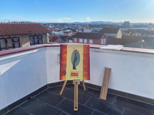 a painting of a fish on top of a building at Lighthouse in Vodice