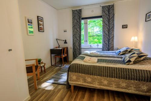 Postel nebo postele na pokoji v ubytování Brukshotellet Skinnsberg