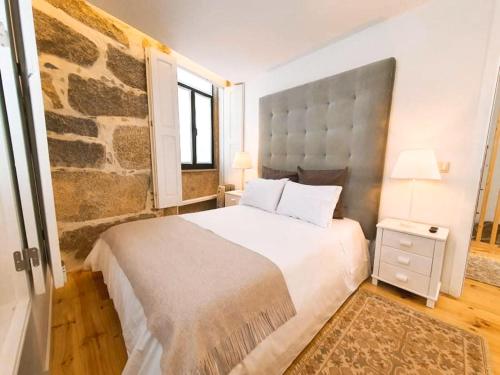 Säng eller sängar i ett rum på Casa dos Sequeiras Port Wine Cellars