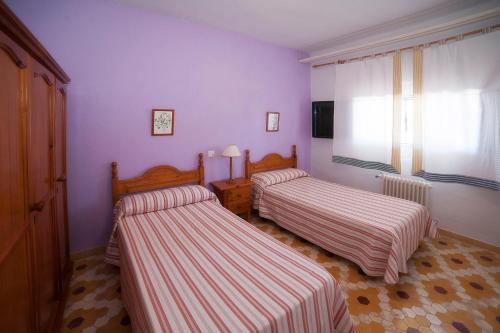 Кровать или кровати в номере Cortijo de Frías