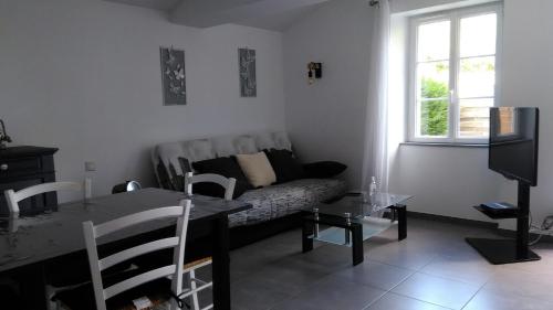 Ein Sitzbereich in der Unterkunft Gîte avec piscine ,près de Chantonnay