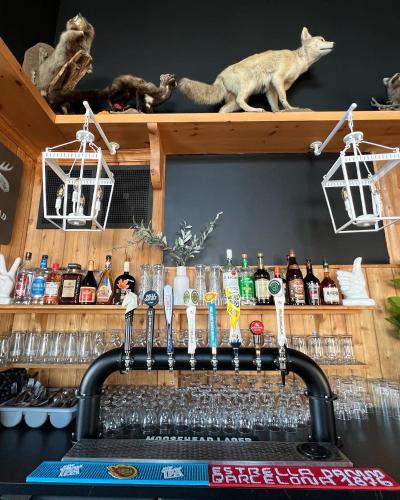 Lounge atau bar di Auberge au Poste de Traite