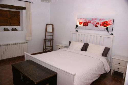 Säng eller sängar i ett rum på Cortijo El Álamo