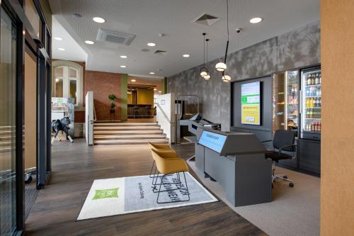 ibis Styles Coburgにあるテレビまたはエンターテインメントセンター